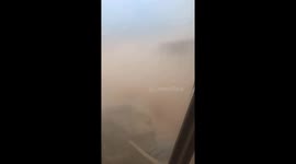 This is what it looks like being trapped inside truck as dust storm passes by