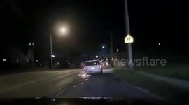 Exposed Rim Causes Car To Ignite And Leave Fiery Trail Along Road In Kenosha, WI, USA