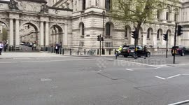 Anti-Meloni protesters gather outside Downing St as the Italian Prime Minister arrives for a visit