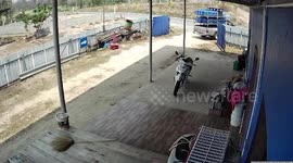 Water delivery man clambers up pickup truck to escape client's pet dog