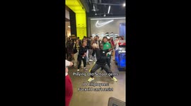 JD sports employees dance at work as DJ plays 'old-school' songs