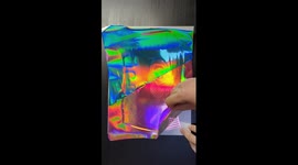 Satisfying ASMR peel of the hand drawn and hand foiled portrait of Zooey Zephyr