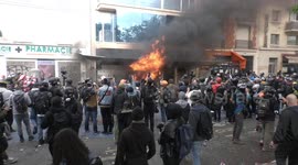 Protesters in Paris set building on fire during May Day protest which turned ugly