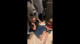 Children hiding during a thunderstorm win hearts with their innocent expressions