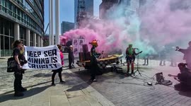 Environmental activists bring heavy metal concert to Deep Sea Mining Summit in London's Canary Wharf