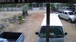 Flying bin lid knocks over man during strong winds in Thailand