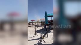 Dust devil tornado towers over welders in Arizona