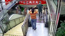Man causes a mess after letting go of shopping trolley on escalator in southern China
