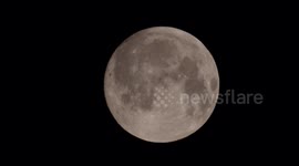 Full flower moon seen from Switzerland in this 4K video