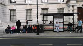 People camping out in Whitehall play the classic song Bluebirds Over The White Cliffs Of Dover