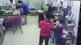 Busy worker falls on butt sitting on missing chair grabbed by his colleague