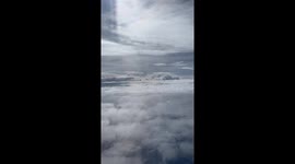 Flight above the clouds