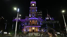 Sydney Town Hall is lit up in purple, believed to be fro the coronation, Australia