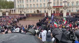 King Charles III greets thousands from Buckingham Palace balcony