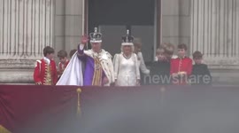 King Charles III greets thousands from Buckingham Palace balcony