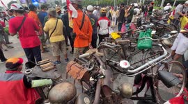 Vintage Bike Enthusiasts and Onthel Community Hold Halal Bihalal Event During Car Free Day in Jakarta, Indonesia