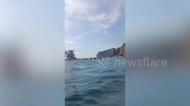 Dozens of tourists floating in sea rescued in southern Thailand