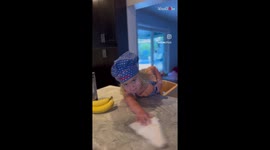 Talented toddler makes mom's morning special by preparing a latte for her