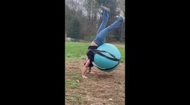 Backyard Ballin': Woman bounces with yoga ball duct-taped to her back in New York