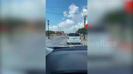 Two adults and a child run for their lives after their vehicle was stuck on railroad moments before train crash