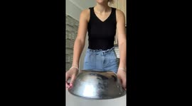 Woman learns how to NOT BAKE a cake in her first rodeo in the kitchen