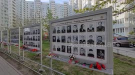 Photos and flowers for the USSR soldiers who fight in WW2 as commemoration for the Victory Day, in local court yard of St Petersburg,  Russia
