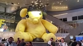 Large bear statue welcomes passengers at Hamad Airport, Doha, Qatar