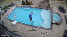 Man's Ladder Tips Over Into Pool
