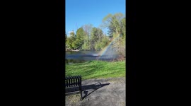 Father and Son Witness Whirlwind on Creek Create Beautiful Rainbow