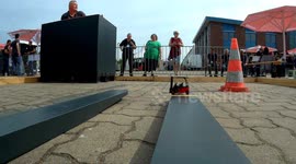 Big Forklift Uses Tiny Forklift With Incredible Precision