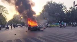 Cars burn in the street following Imran Khan arrest in Pakistan