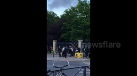 The police disperse people from all sides outside the park in Paris, France