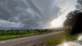 Brief supercell associated with a shelf cloud in Mountainburg,AR