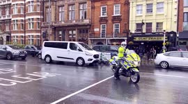 A Police Special Escort Group Seen Leading An Embassy Convoy To Kensington Palace Gardens