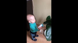 Playful imagination: Sasha's serenade with the spray bottle