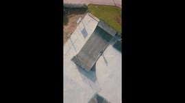 Drone video of a friend skating a half pipe