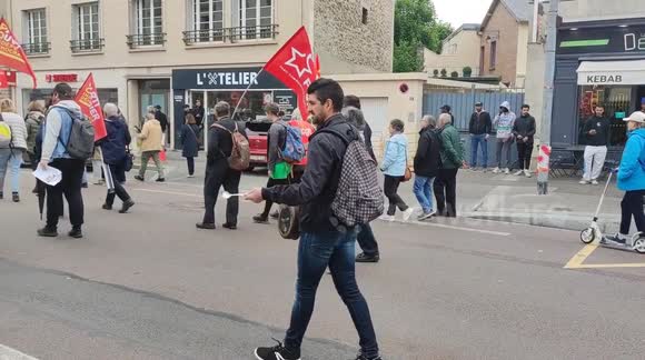 Mass protest in Paris against pension reform plans with firecrackers