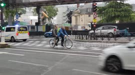 Tandem bicycle in the streets of Paris, Boulevard de l'Hôpital, France. 15 may 2023