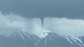 Tornado Appears Over Mountains in Montana