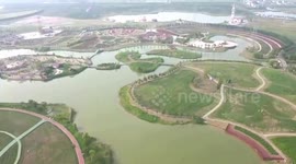 Tourists Enjoy Flowers in A Rose Plantation in Lianyungang, China
