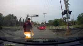 Van Breaks Down on Train Tracks