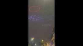 Two hundred and sixty drones show light in the sky during the festival in Vietnam