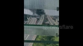 Bus parked at Paris' Roissy-Charles De Gaulle Airport esplanade catches fire