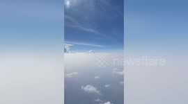 Plane passengers shocked when huge ROCKET flies past their window at 20,000ft