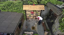 Dad spent £10K transforming his drab backyard into a Japanese garden - and has now added a monk's Zen space