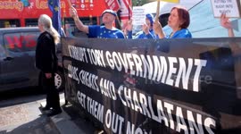 why why why Suella ? home office toxic attitude given a earbug , Sodem  protest, Whitehall London uk