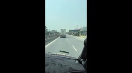 Truck's Unsecured Cargo Precariously Teeters