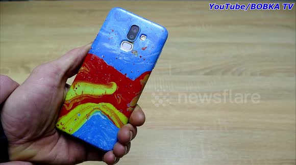 YouTuber shows how to give phones sensational makeovers using hydro dipping