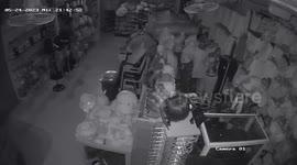 CCTV footage shows magnitude 6.6 earthquake rattling shop racks in Colombia