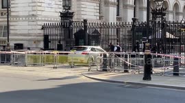 Police set up cordon as man crashes car into Downing Street security gates